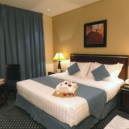 Onizah Hotel Unaizah Phòng bức ảnh